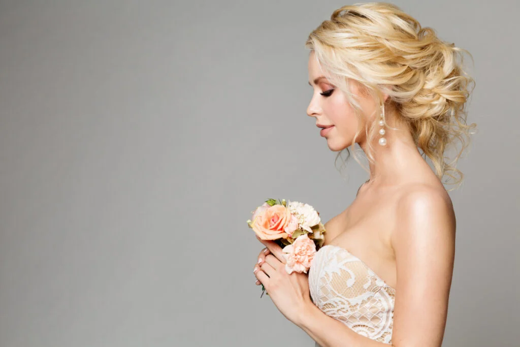 Beautiful Bride with Bouquet of Flowers on Her Wedding Day