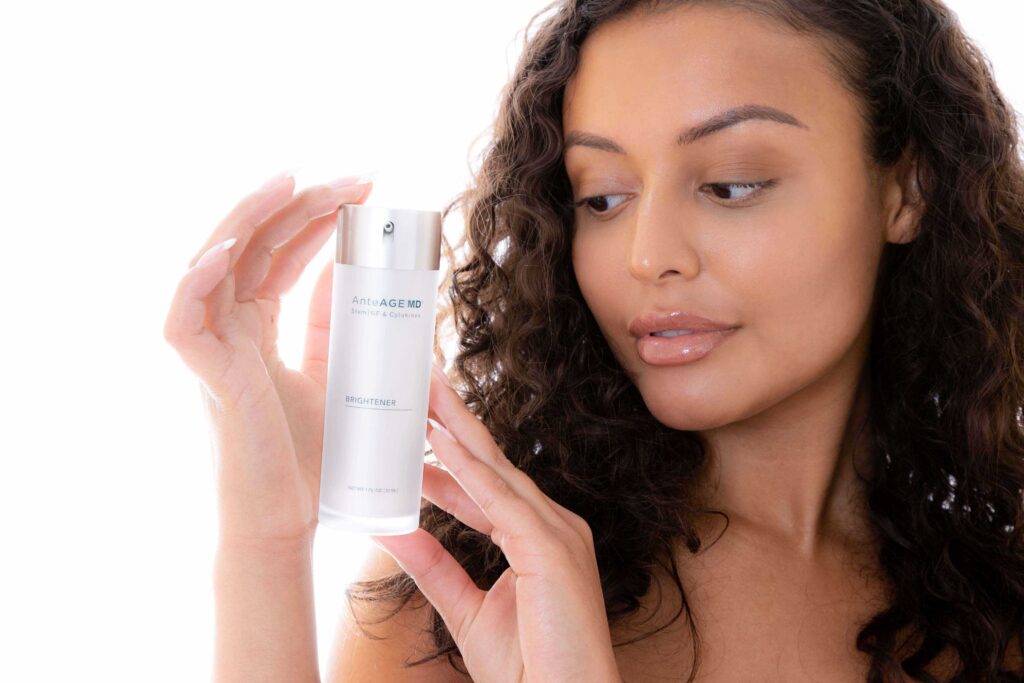 Model holding AnteAge MD Brightener